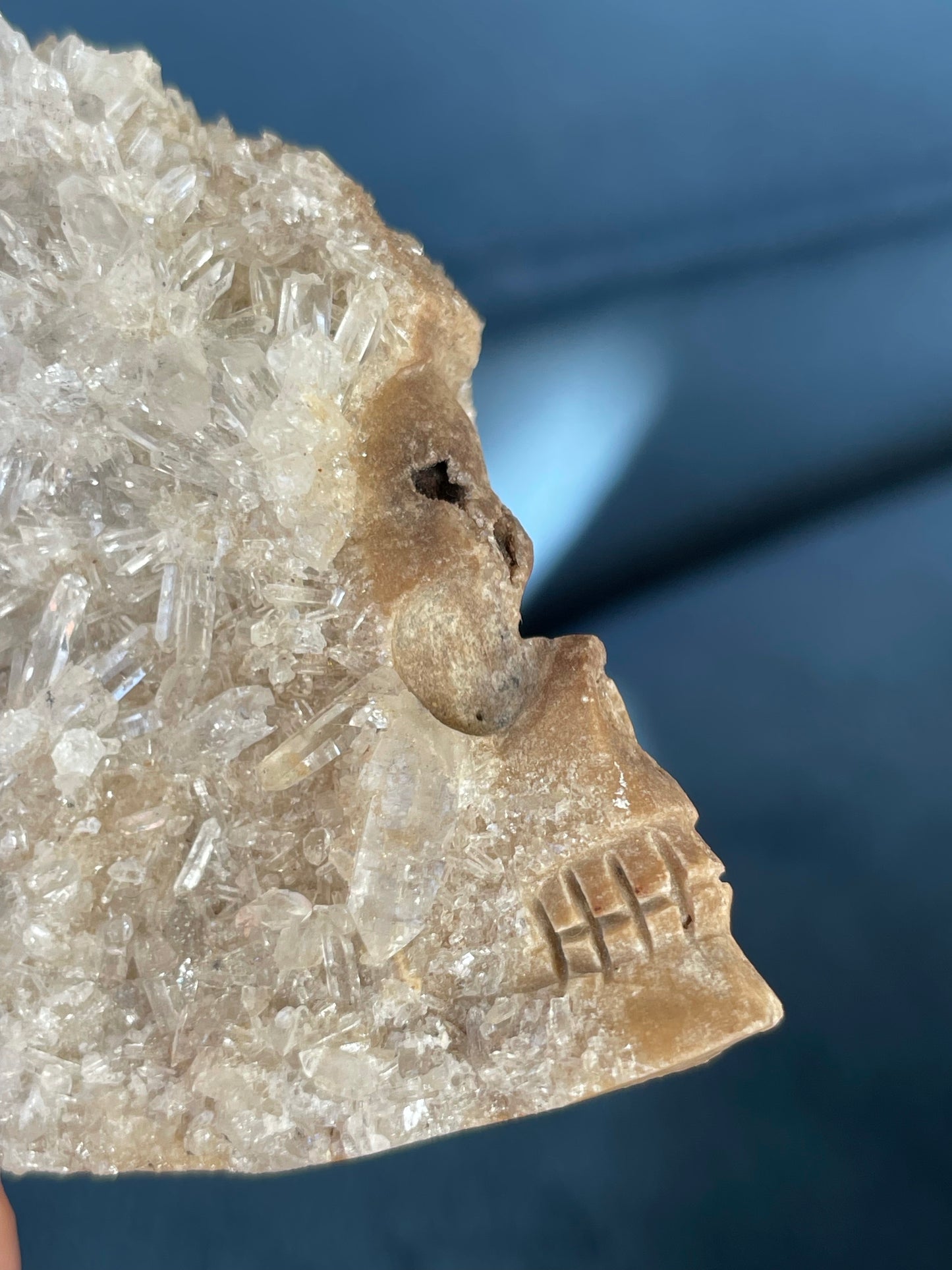 Carved Crystal Skull Cluster